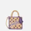Beigefarbene, natürliche Mini-Kosmetiktasche aus Raffiabast mit gepunkteten Applikationen