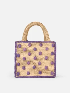 Beigefarbene, natürliche Mini-Kosmetiktasche aus Raffiabast mit gepunkteten Applikationen