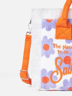 Colette-Handtasche aus Frottee mit violettem und orangefarbenem Gänseblümchen-Print