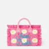 Colette-Handtasche mit gehäkelten Blumenaufnähern