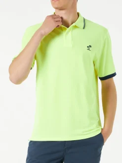 Fluogelbes Piquet-Polo mit St. Barth-Logo