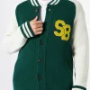 Grüne Strickbomberjacke im College-Stil