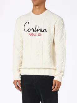 Herrenpullover aus Zopfmuster-Kaschmirmischung „Bergen“ mit Stickerei „Cortina Natale '83“ | VACANZE DI NATALE SONDEREDITION