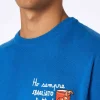 Herren-Skipullover Heron in Blau mit Stickerei „Ho sempre sbagliato tutto“.