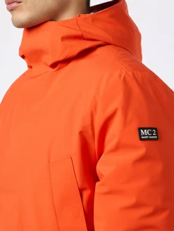 Orangefarbener Parka für Herren mit Kapuze und Bandana-Futter