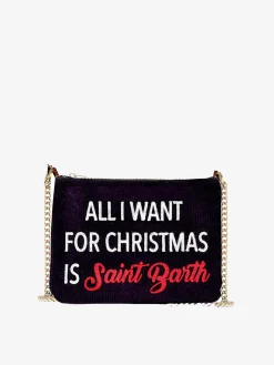 Parisienne-Umhängetasche Clutch aus Samt mit Motiv und der Stickerei „All I want for Christmas is Saint Barth“.