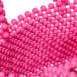 Perlenbesetzte rosa Handtasche mit grünem Herz