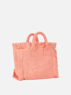 Pfirsichfarbene Colette Terry-Handtasche mit Prägung