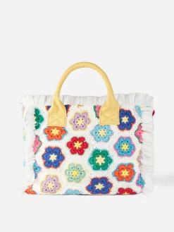 Vanity-Umhängetasche mit gehäkelten Blumen