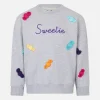 Weißes Mädchen-Sweatshirt mit Rundhalsausschnitt und Süßigkeiten-Aufnähern